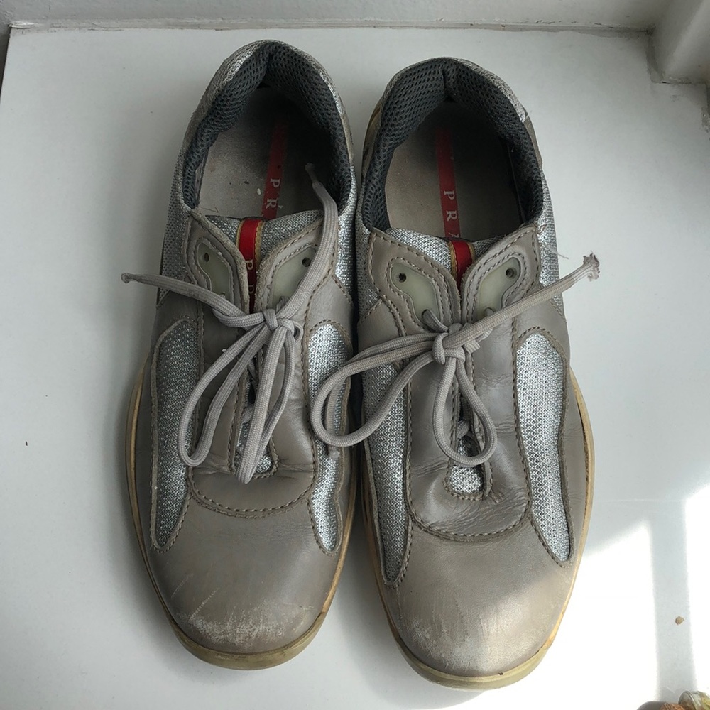 Woman’s gray Prada sneakers used